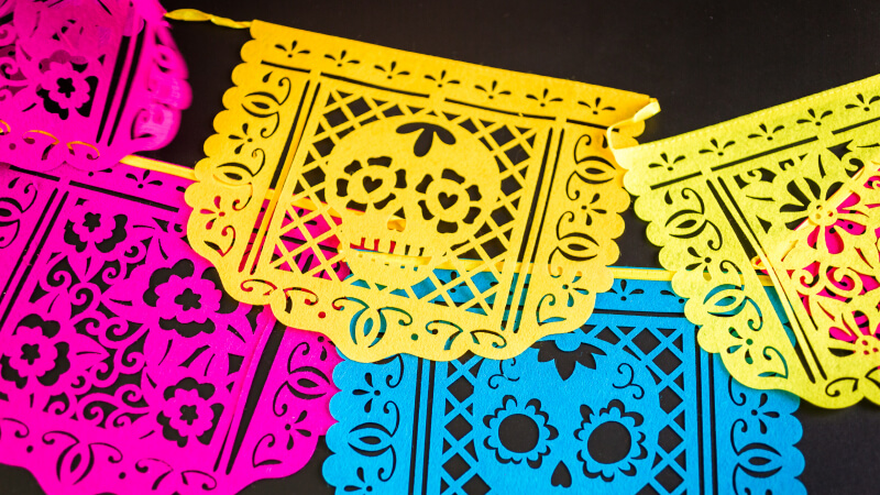 MEXICAN-THEMED DECORATIONS Hang papel picado