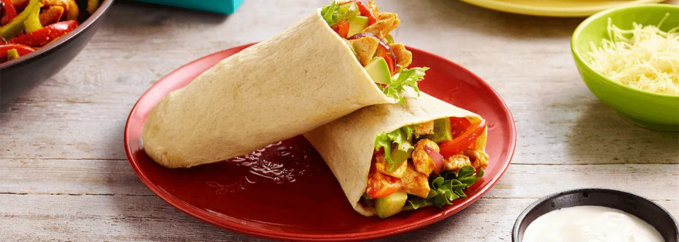 Chicken Fajita Tortilla Pockets served in a red plate