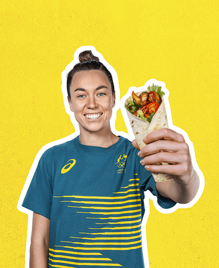 mackenzie arnold holding fajita in hand