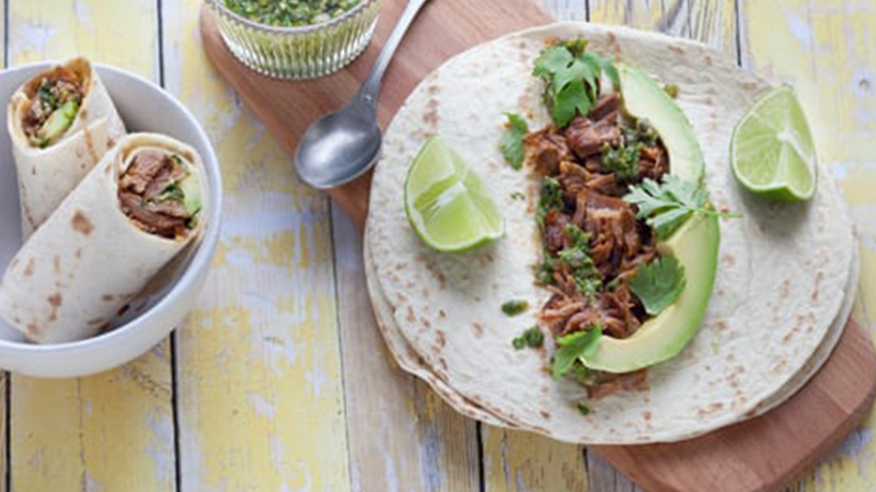 Roasted pork burritos, with avocado and salsa verde hero